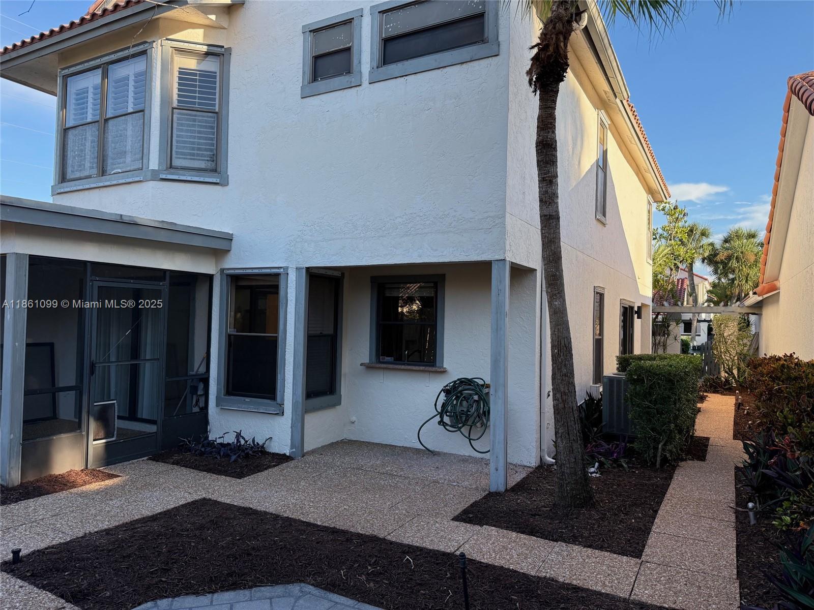 5535 Eton Court Boca Raton, FL 33486 - Photo 60 of 61 a view of a entryway front of house