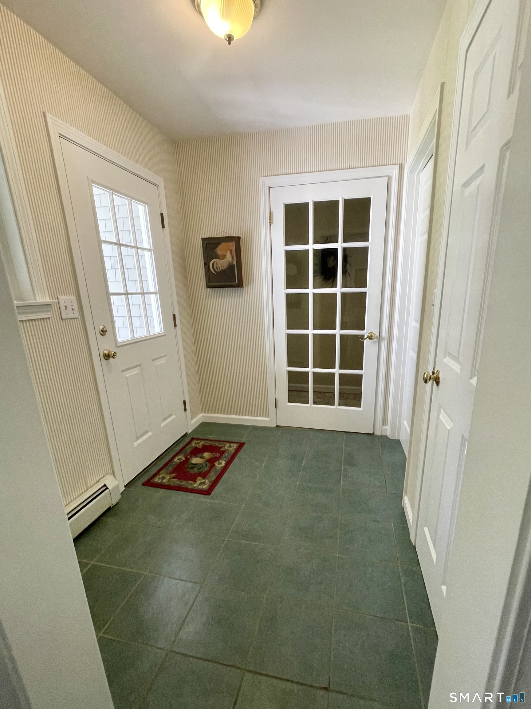 34 Spring Rock Road East Lyme, CT 06333 - Photo 15 of 38 Mud room entrance leading into large laundry room!