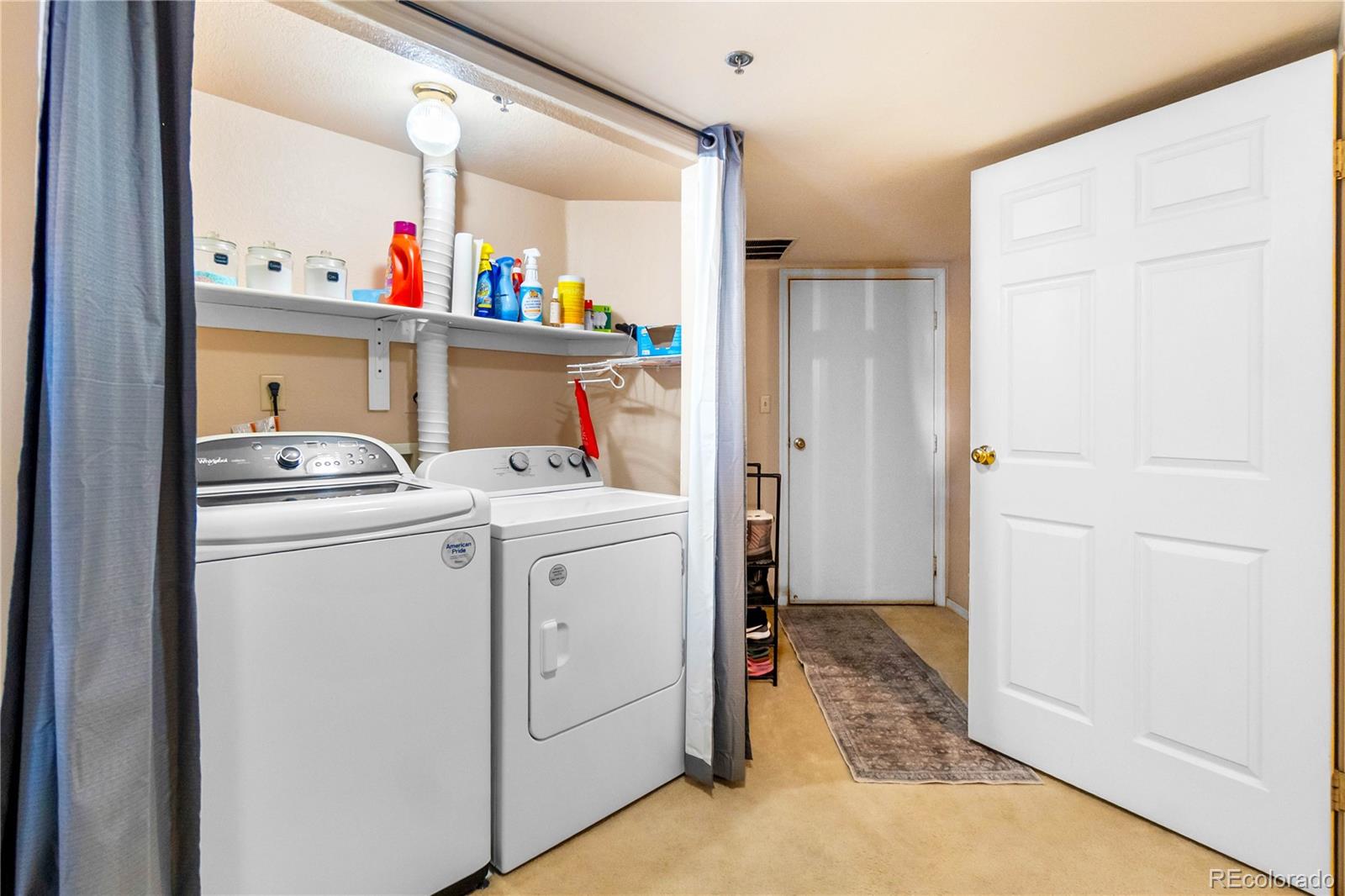 2170 Alicia Point, Unit 102 Colorado Springs, CO 80919 - Photo 22 of 37 a storage room with washer and dryer
