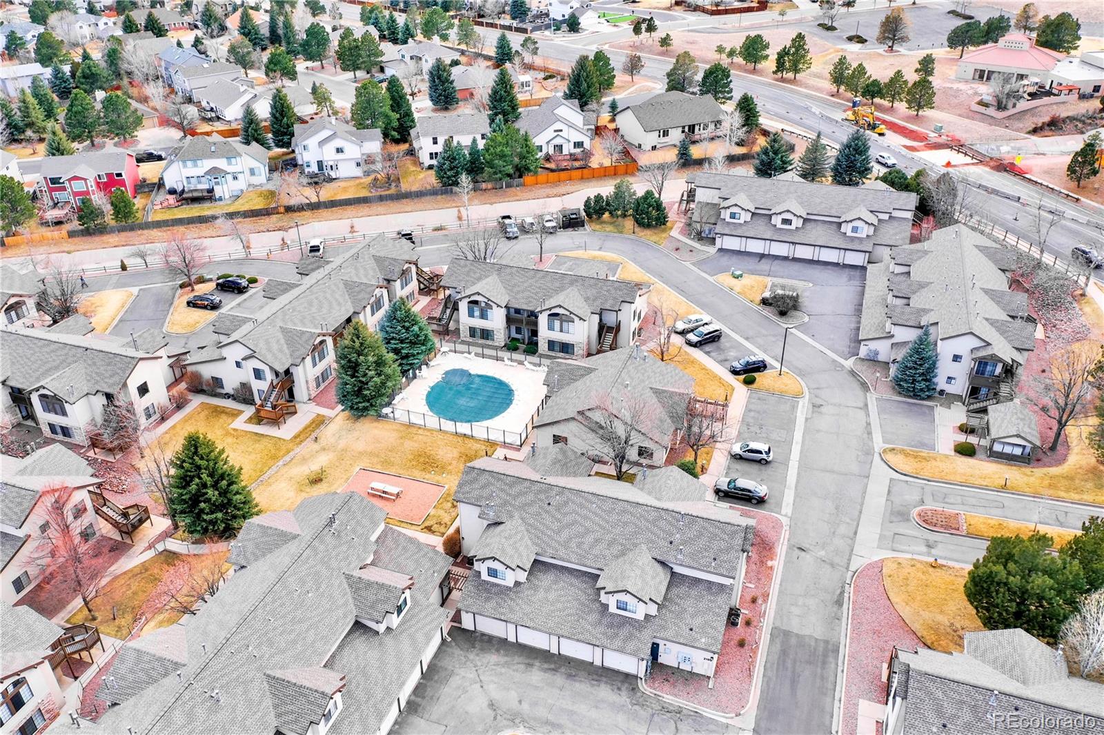 2170 Alicia Point, Unit 102 Colorado Springs, CO 80919 - Photo 28 of 37 an aerial view of residential houses with outdoor space