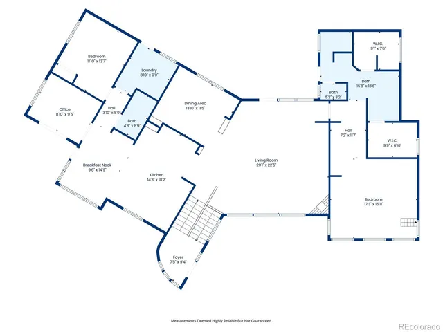 a picture of a room with a white comforter