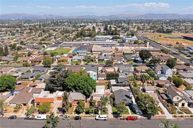 an aerial view of a city with lots of residential buildings
