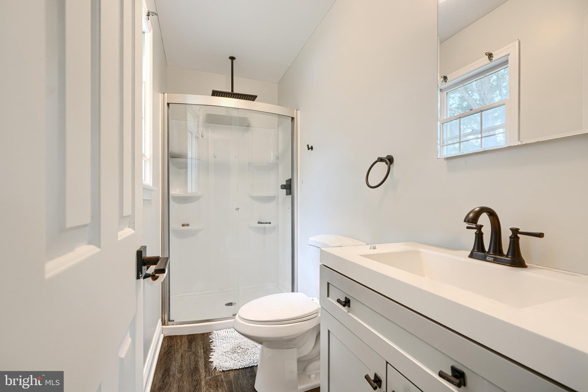 1353 Sweetbriar Lane Bel Air, MD 21014 - Photo 30 of 43 a bathroom with a sink a toilet and shower