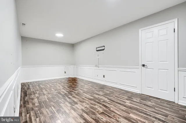 a view of a storage & utility room with a sink