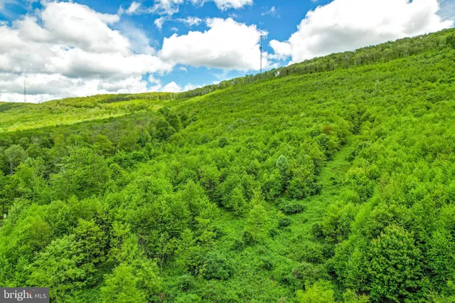 a view of an outdoor space and a mountain view