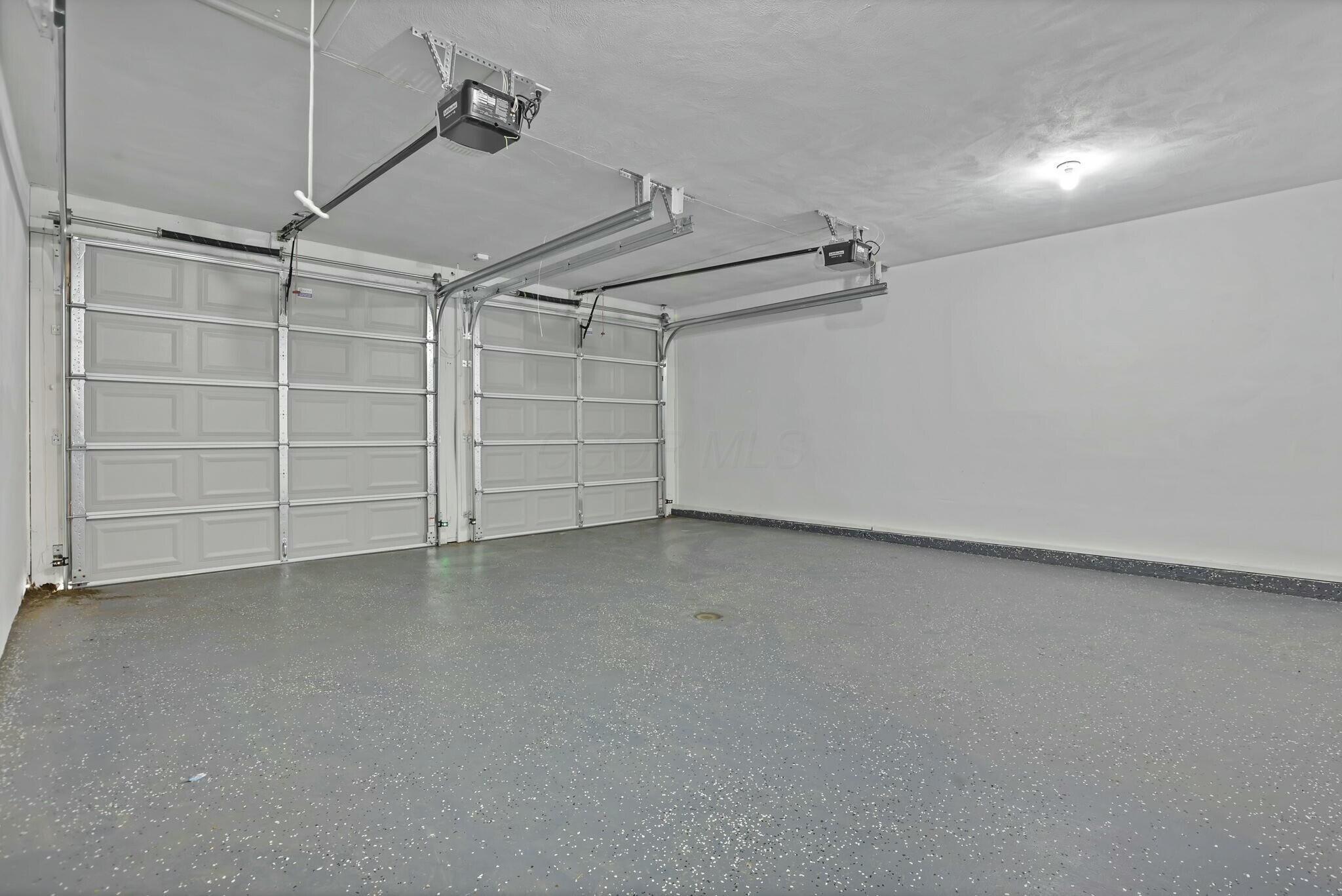 3301 Daglow Road Columbus, OH 43232 - Photo 45 of 60 New garage doors and openers on Attached 2 car oversized garage.