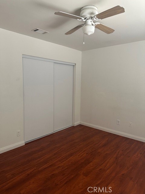 13730 San Martin Road, Unit B Victorville, CA 92392 - Photo 8 of 9 a view of an empty room with a fan