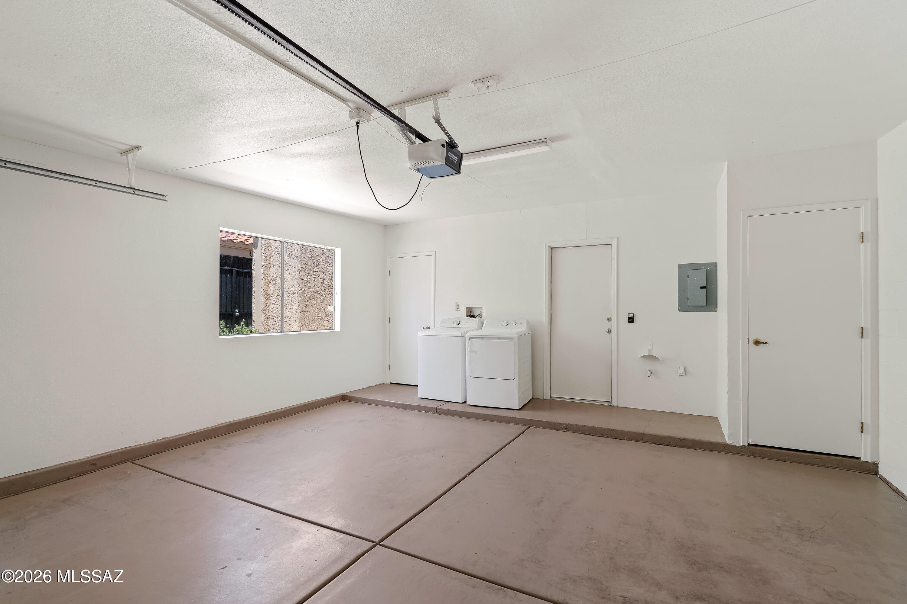 6224 North Rockglen Road Tucson, AZ 85704 - Photo 19 of 26 2 car Garage/ laundry room