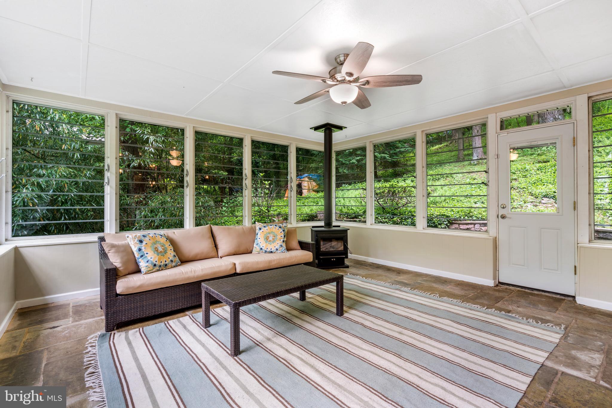 585 Brookwood Road Wayne, PA 19087 - Photo 7 of 20 Sun Room with access to rear patio