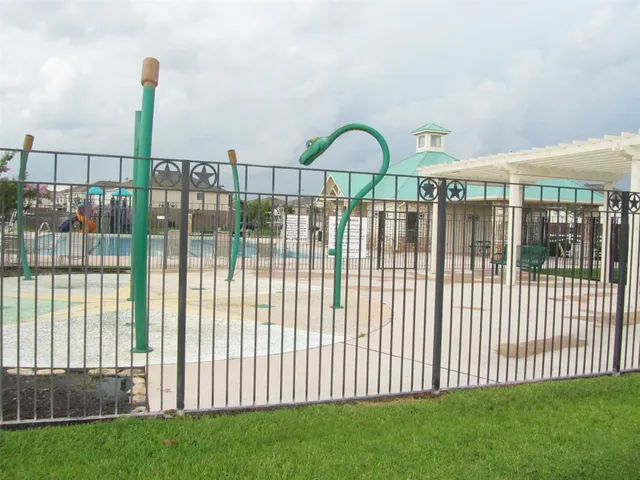 a view of an outdoor sitting area with swimming pool