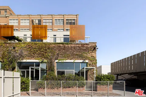 a front view of a building with glass windows