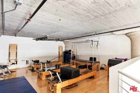 a front view of a building with street view and a building