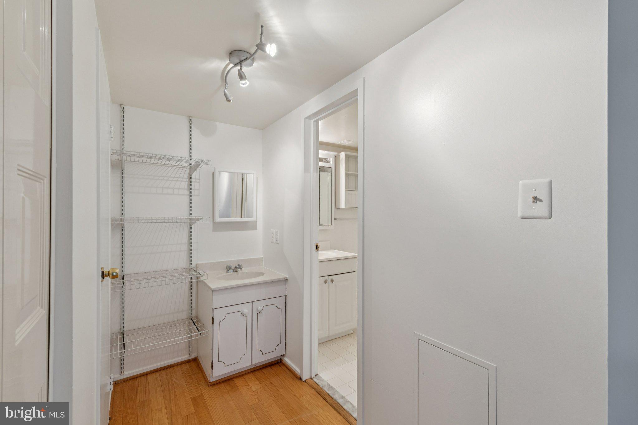2817 Jermantown Road, Unit 108 Oakton, VA 22124 - Photo 18 of 20 a bathroom with a shower