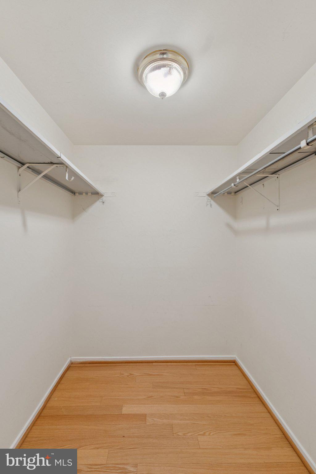 2817 Jermantown Road, Unit 108 Oakton, VA 22124 - Photo 19 of 20 a view of a room with shelf