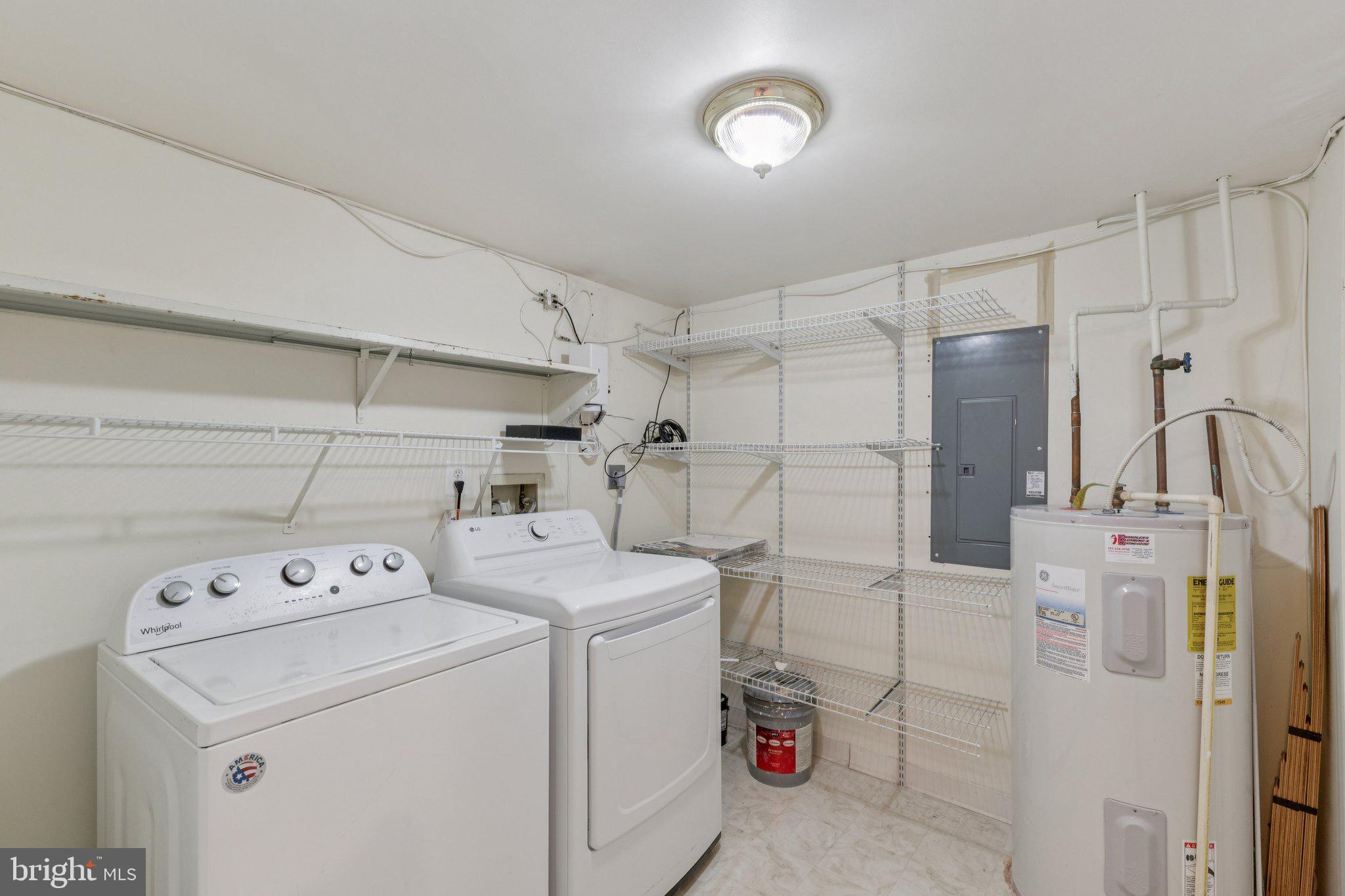 2817 Jermantown Road, Unit 108 Oakton, VA 22124 - Photo 20 of 20 a utility room with dryer and washer
