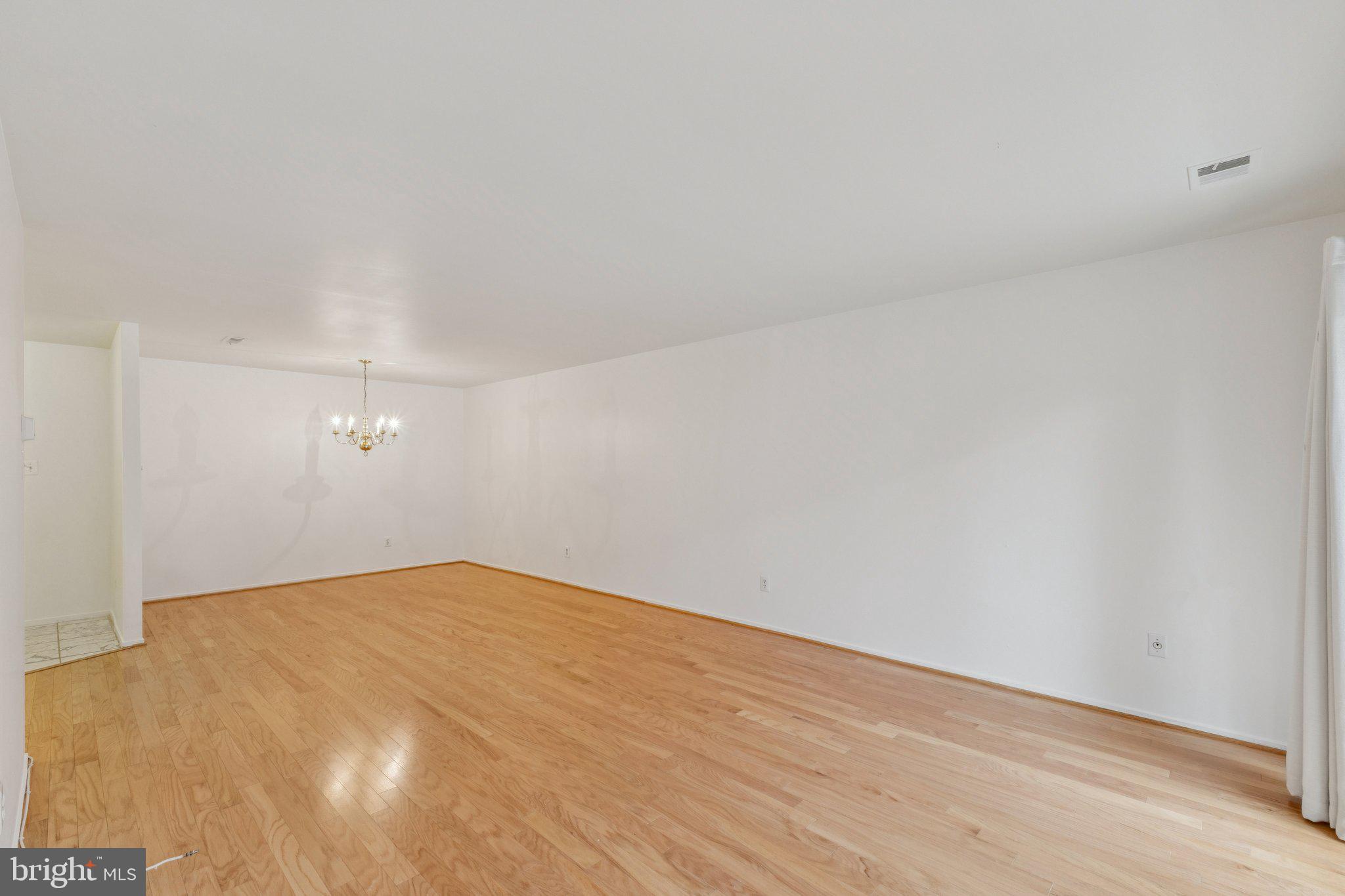 2817 Jermantown Road, Unit 108 Oakton, VA 22124 - Photo 8 of 20 a view of an empty room