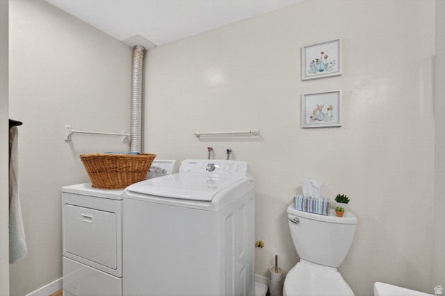 380 Luzern Road Midway, UT 84049 - Photo 55 of 74 Dedicated laundry area featuring a white top-load washer and white front-load dryer