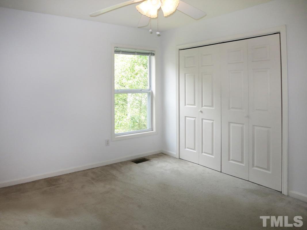 314 Davie Road, Unit A Carrboro, NC 27510 - Photo 11 of 17 an empty room with a window