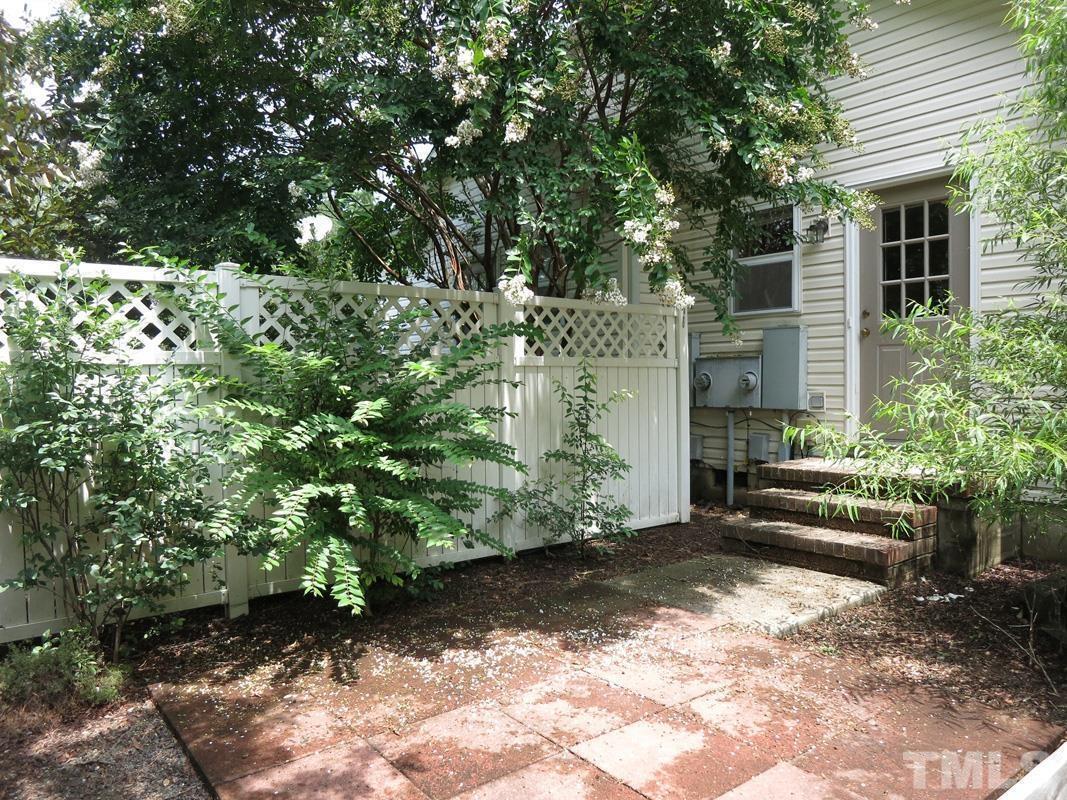 314 Davie Road, Unit A Carrboro, NC 27510 - Photo 14 of 17 a view of a house with a yard