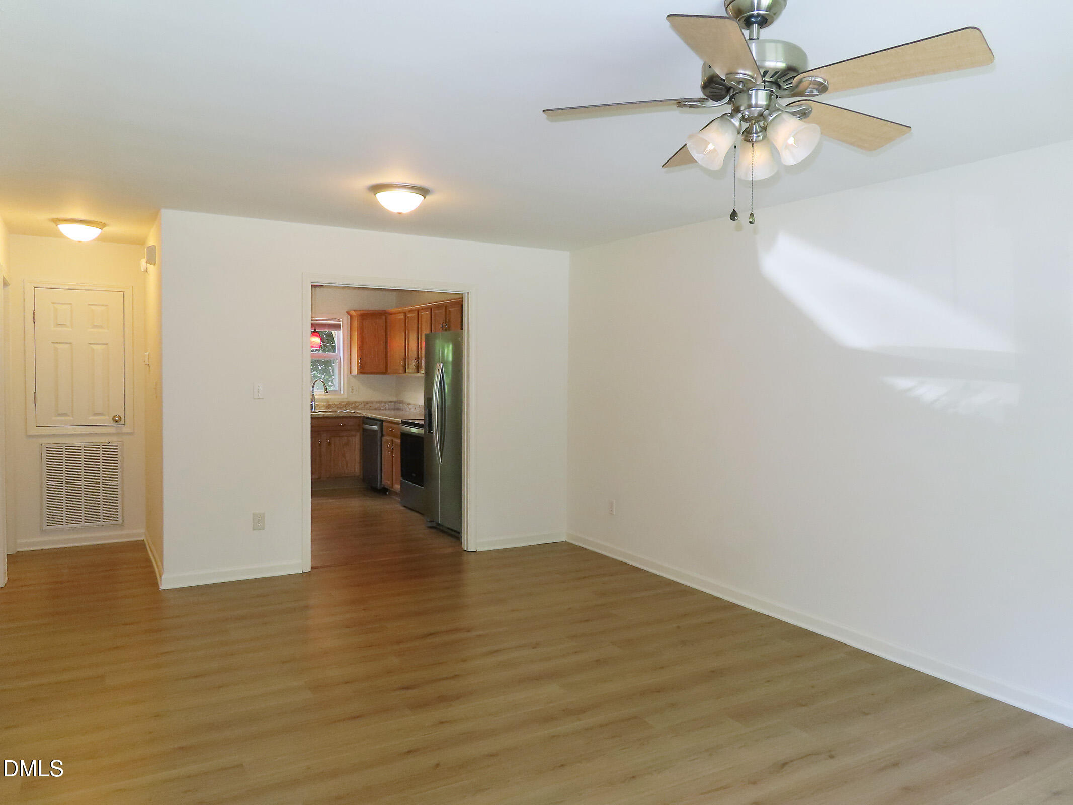 314 Davie Road, Unit A Carrboro, NC 27510 - Photo 4 of 17 wooden floor in an empty room with a window