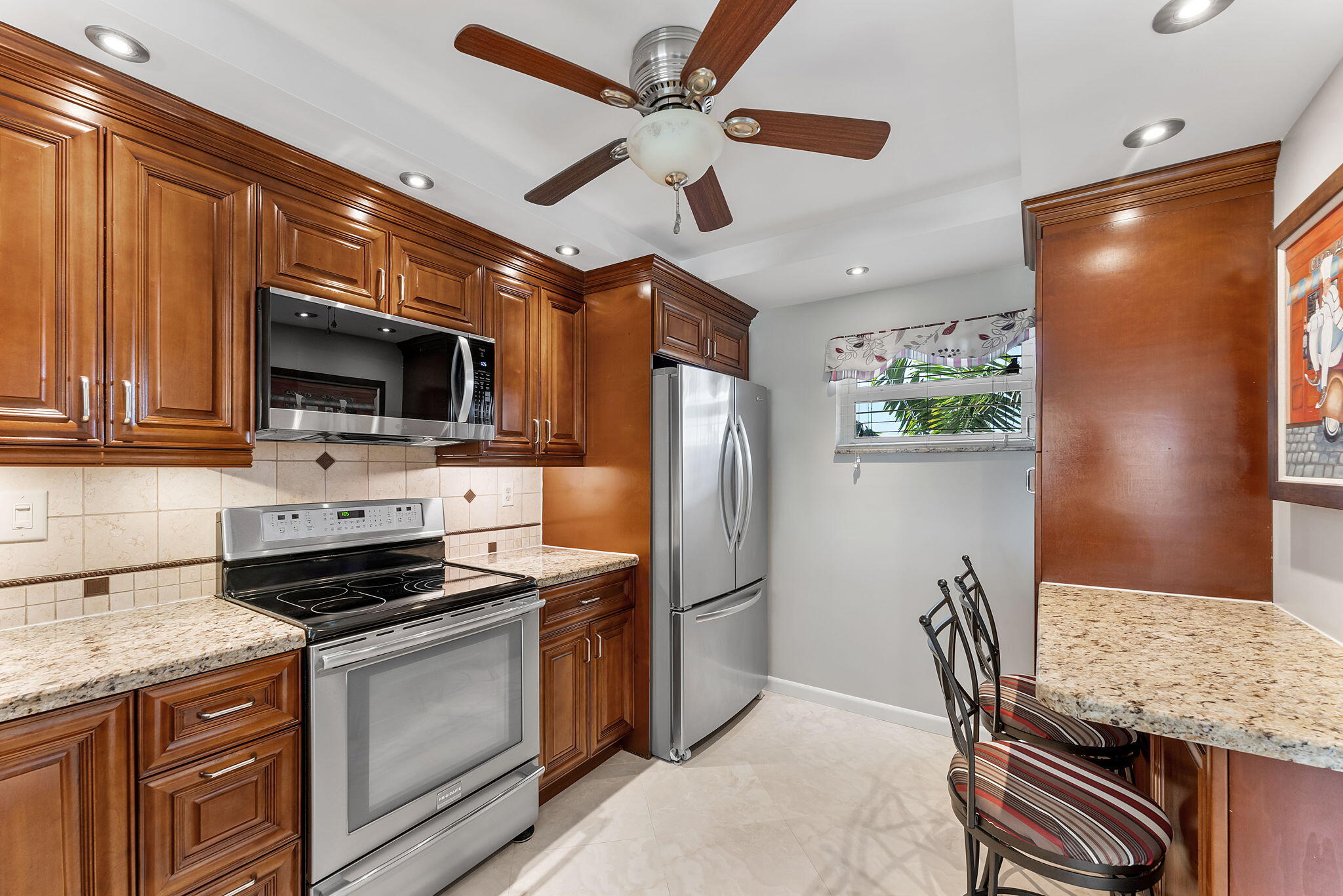 3930 Inverrary Boulevard, Unit 505D Lauderhill, FL 33319 - Photo 13 of 30 Kitchen Area