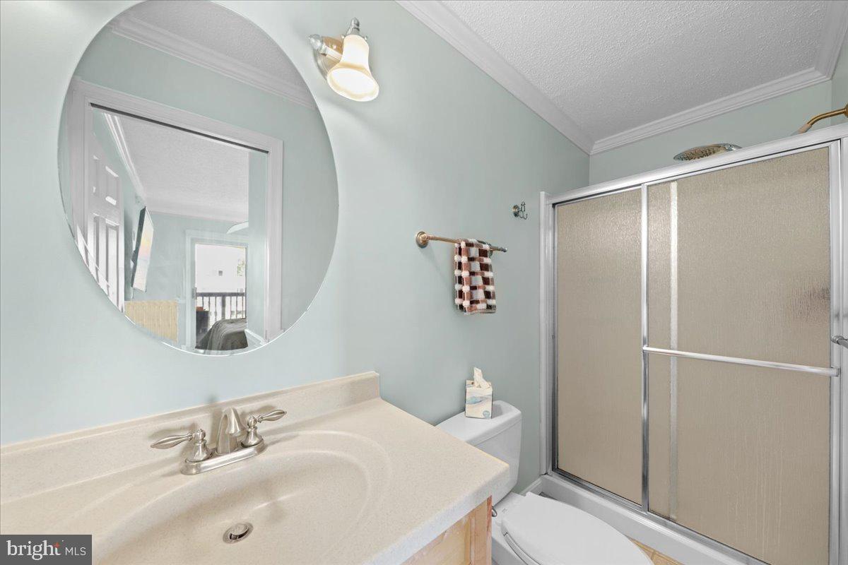 128 Captains Quarters Road, Unit 204 Ocean City, MD 21842 - Photo 20 of 32 Primary Bedroom Bath