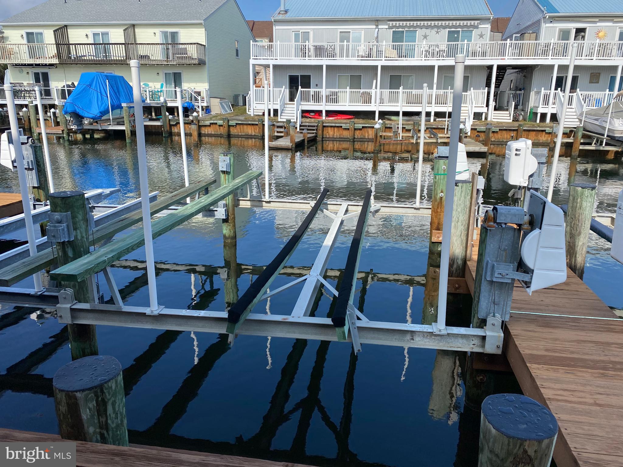 128 Captains Quarters Road, Unit 204 Ocean City, MD 21842 - Photo 26 of 32 Deeded boat slip with new lift