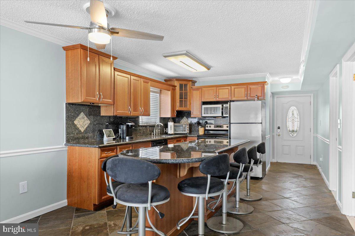 128 Captains Quarters Road, Unit 204 Ocean City, MD 21842 - Photo 4 of 32 Updated kitchen