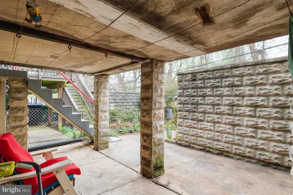 a bathroom with a sink a vanity and a shower curtain