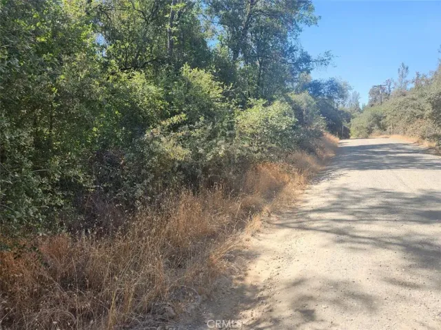 a view of a city with mountains in the background