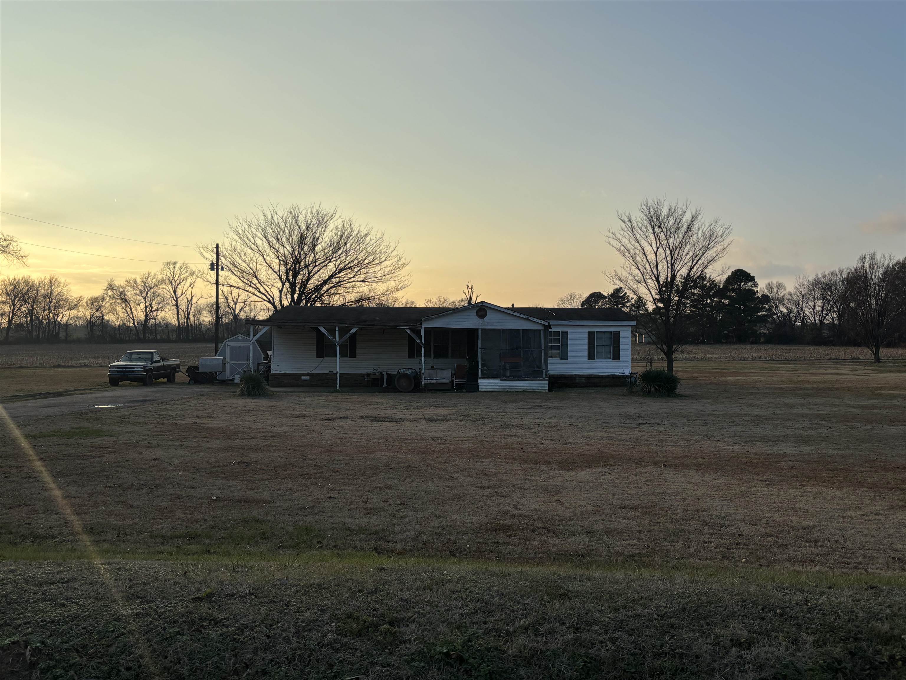 View of front of property featuring a front yard