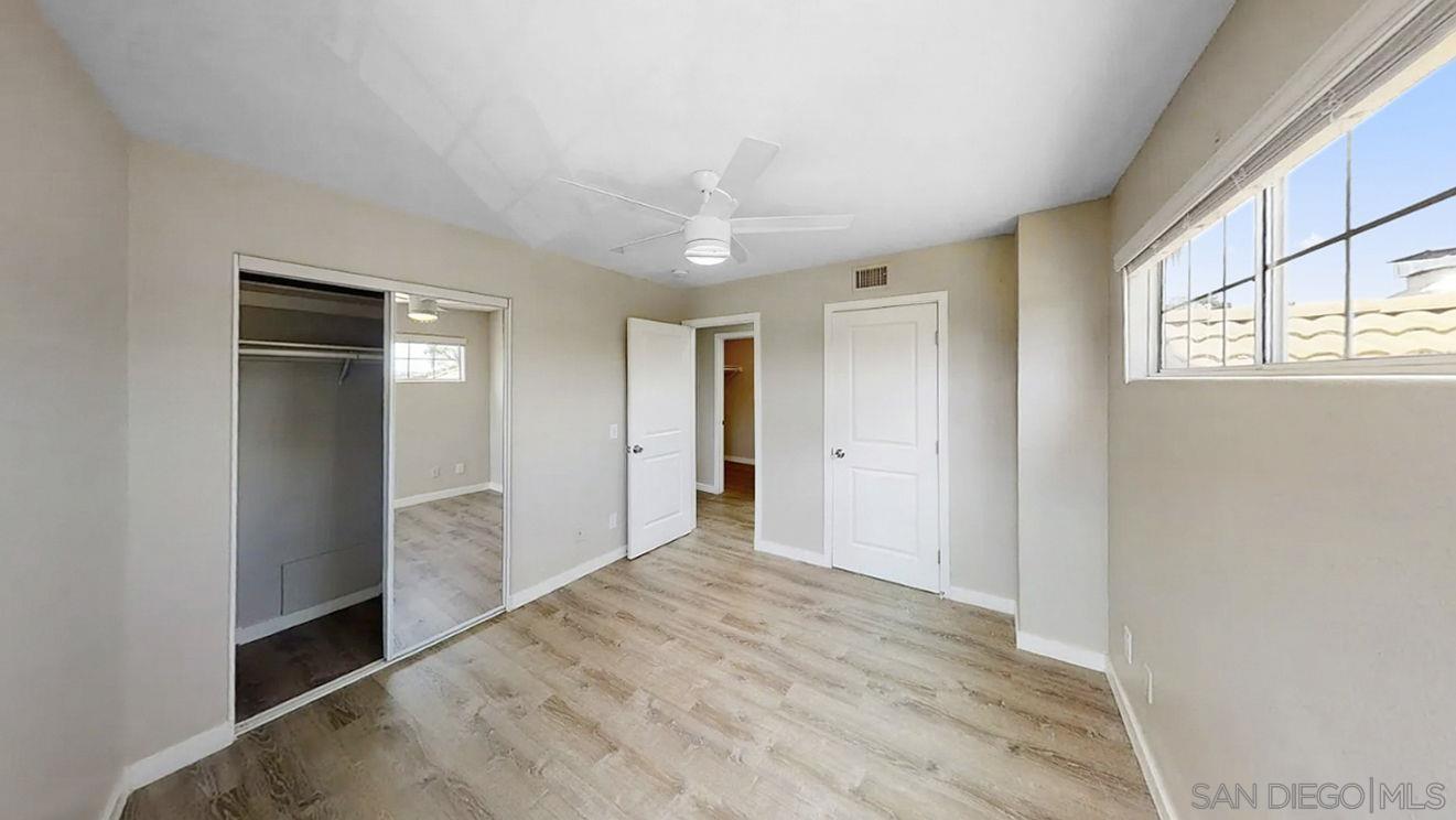 6497 Montezuma Road San Diego, CA 92115 - Photo 10 of 23 a view of an empty room with window and closet area