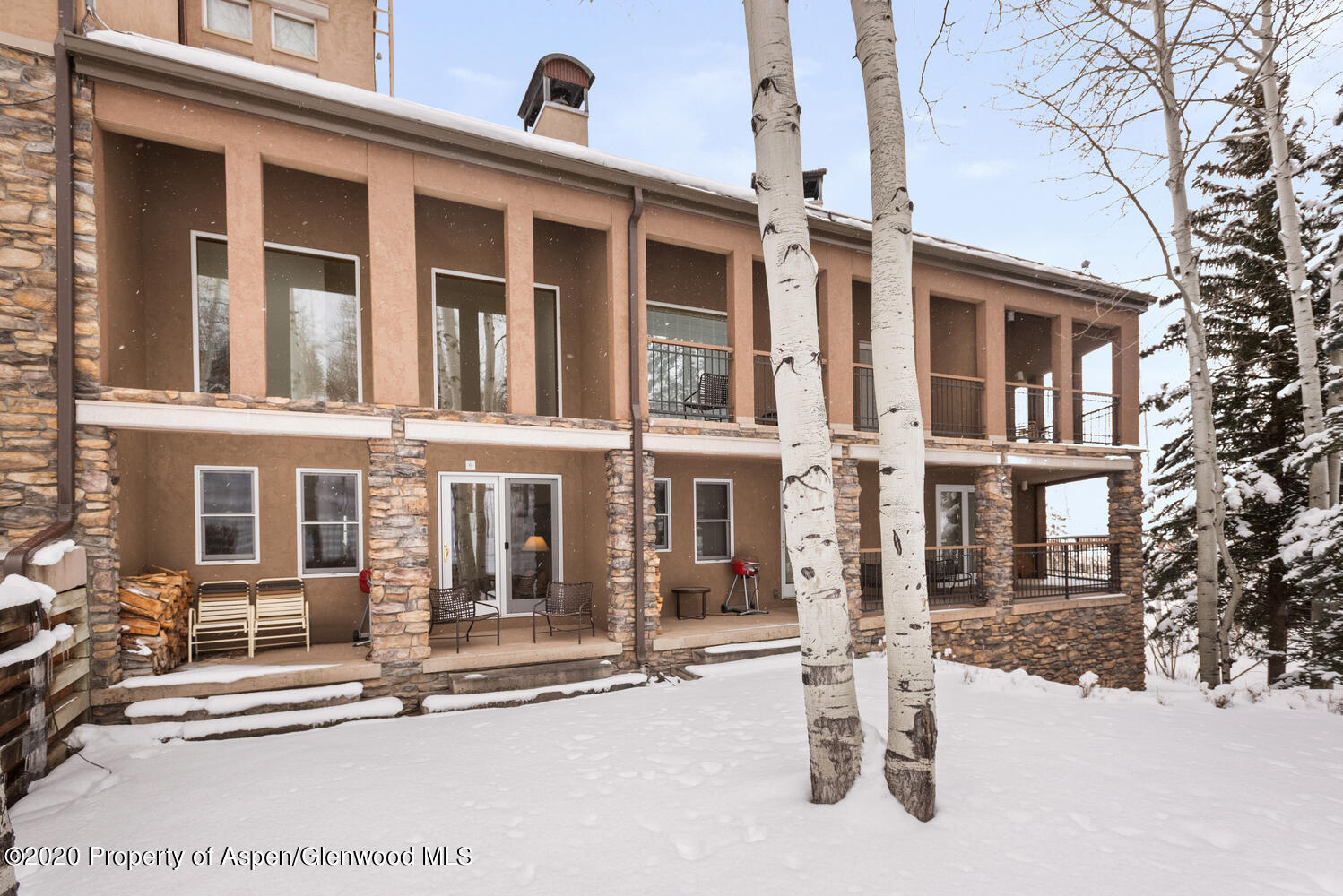 425 Wood Road, Unit 6 Snowmass Village, CO 81615 - Photo 3 of 16 front view of a building