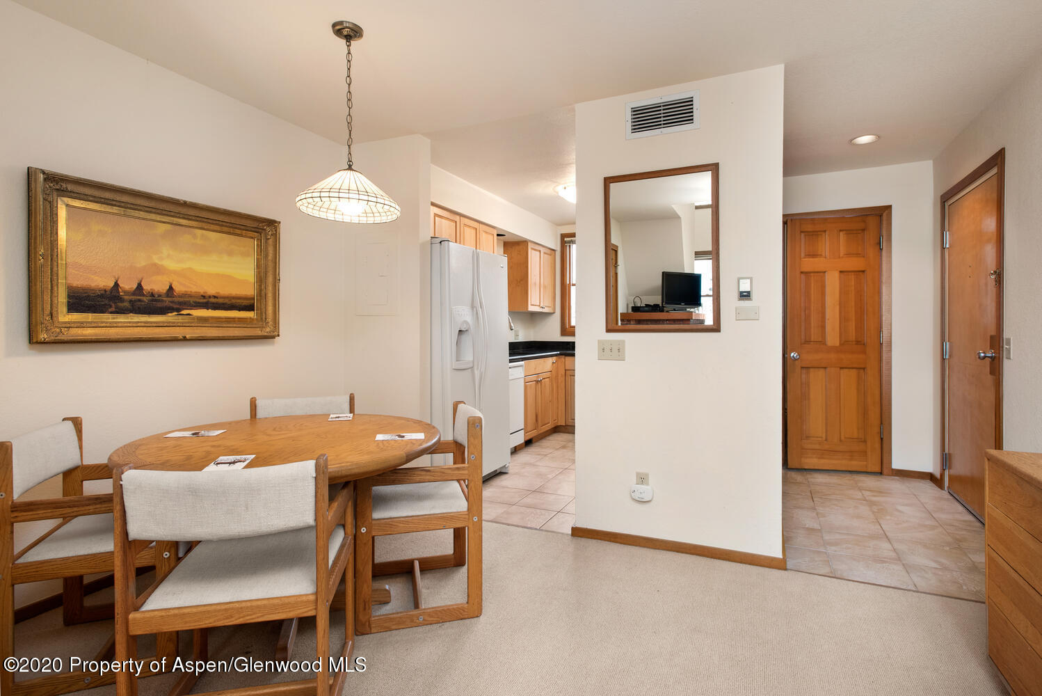 425 Wood Road, Unit 6 Snowmass Village, CO 81615 - Photo 7 of 16 a dining room with furniture and window