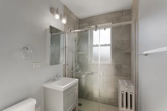 a view of a building with sitting area