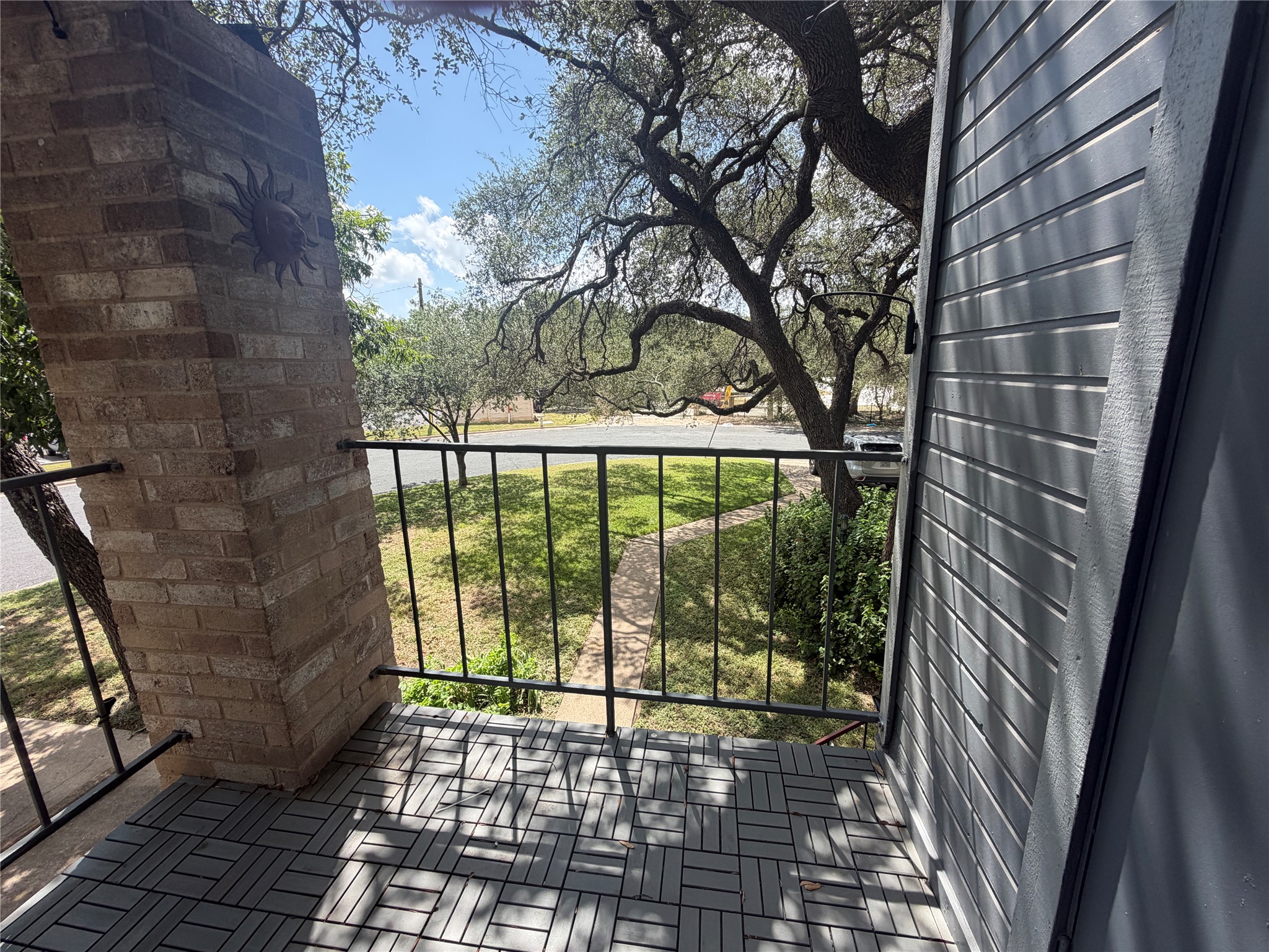 3744 Valley View Road, Unit C Austin, TX 78704 - Photo 6 of 25 a view of a porch with a floor to ceiling window next to a yard