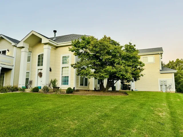 a front view of house with yard