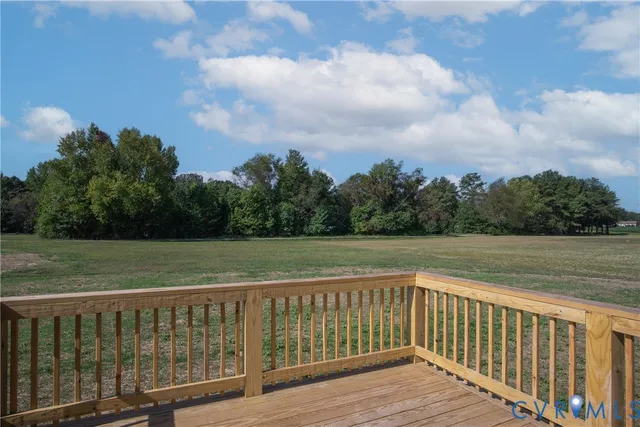 a wooden house with a bench in front of the house