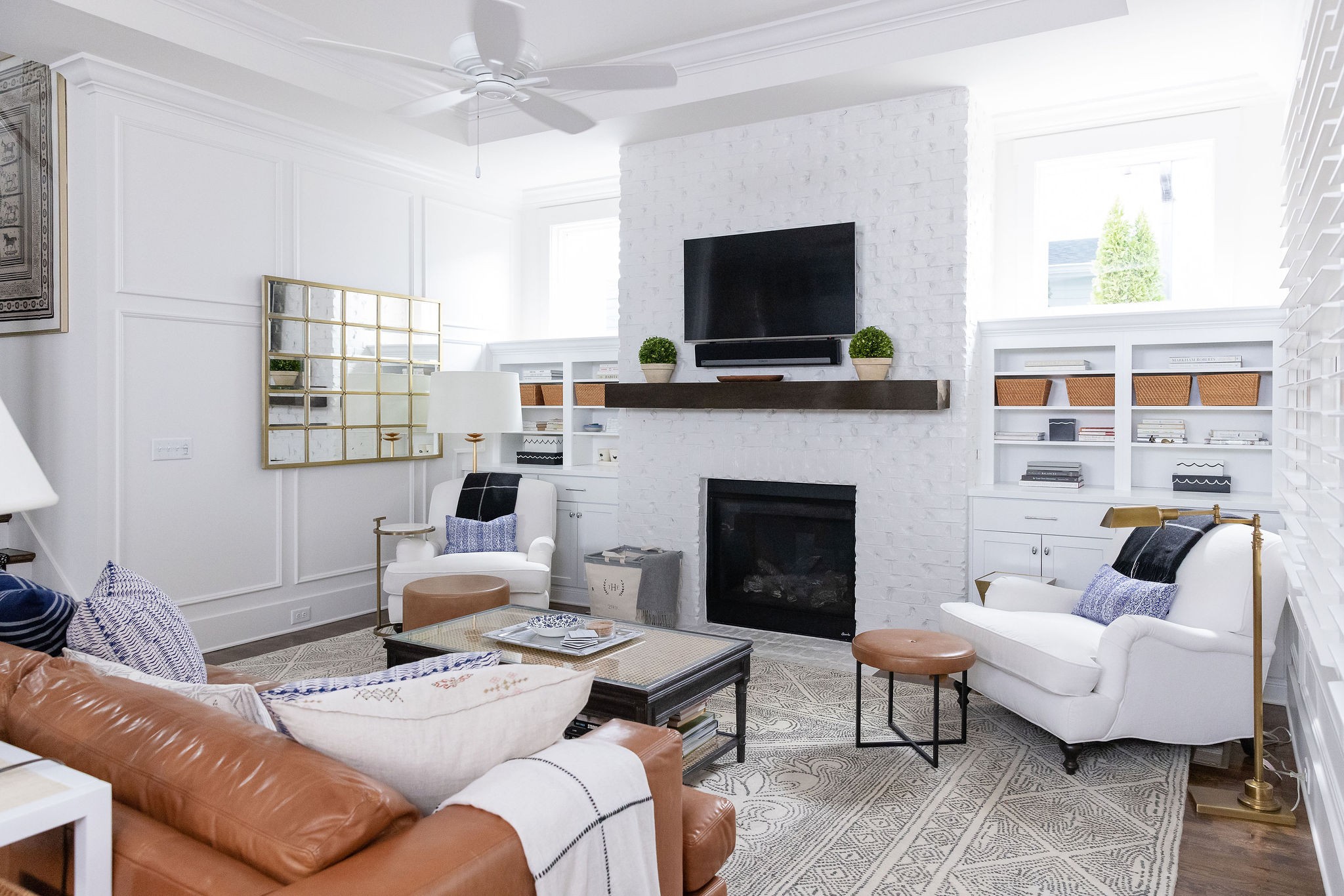 1507 Eliot Road Franklin, TN 37064 - Photo 18 of 67 a living room with furniture a fireplace and a flat screen tv