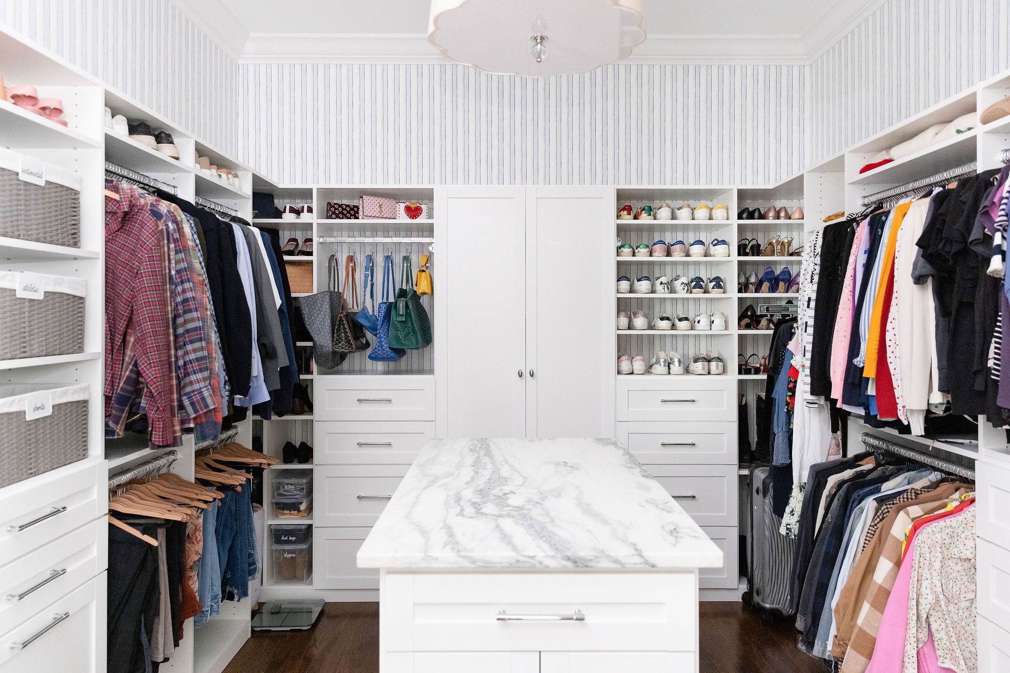1507 Eliot Road Franklin, TN 37064 - Photo 26 of 67 a view of walk in closet with clothes and shoes