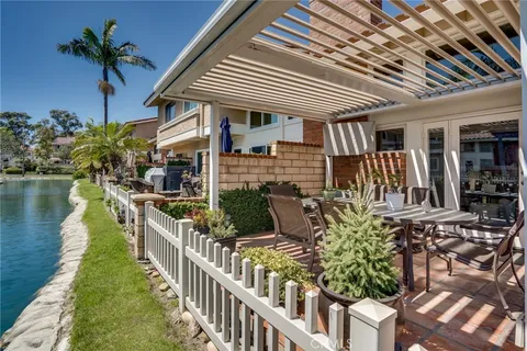 a aerial view of a house with swimming pool and porch