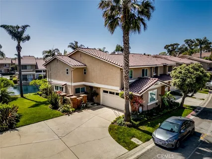 a view of a patio with swimming pool table and chairs