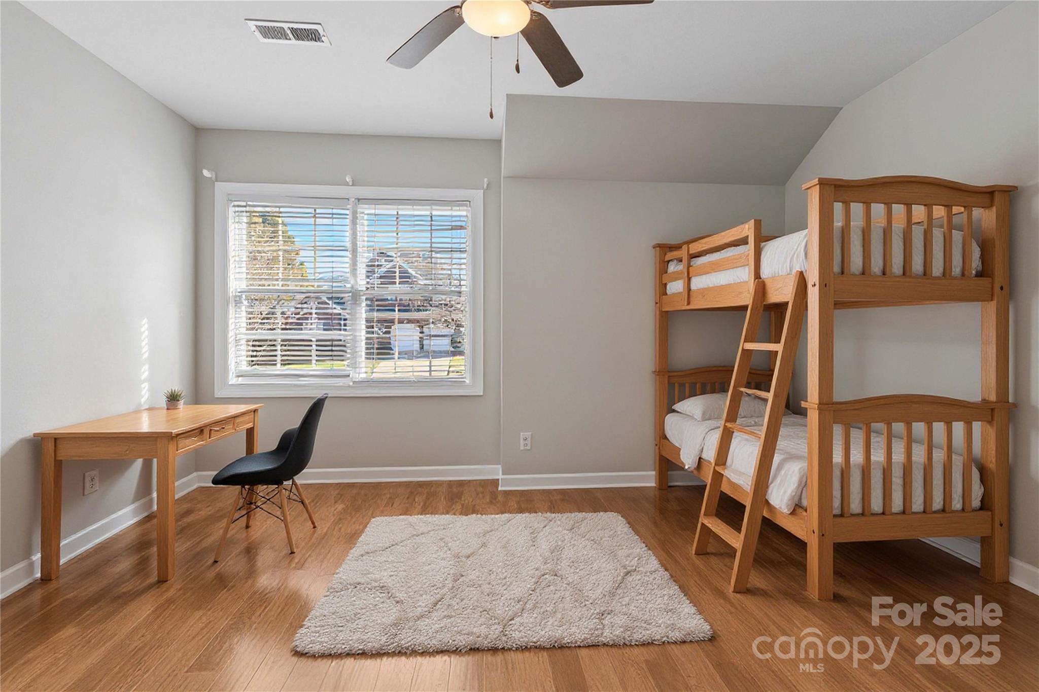 3214 Grandeur Road Charlotte, NC 28269 - Photo 6 of 18 a room with furniture and a window