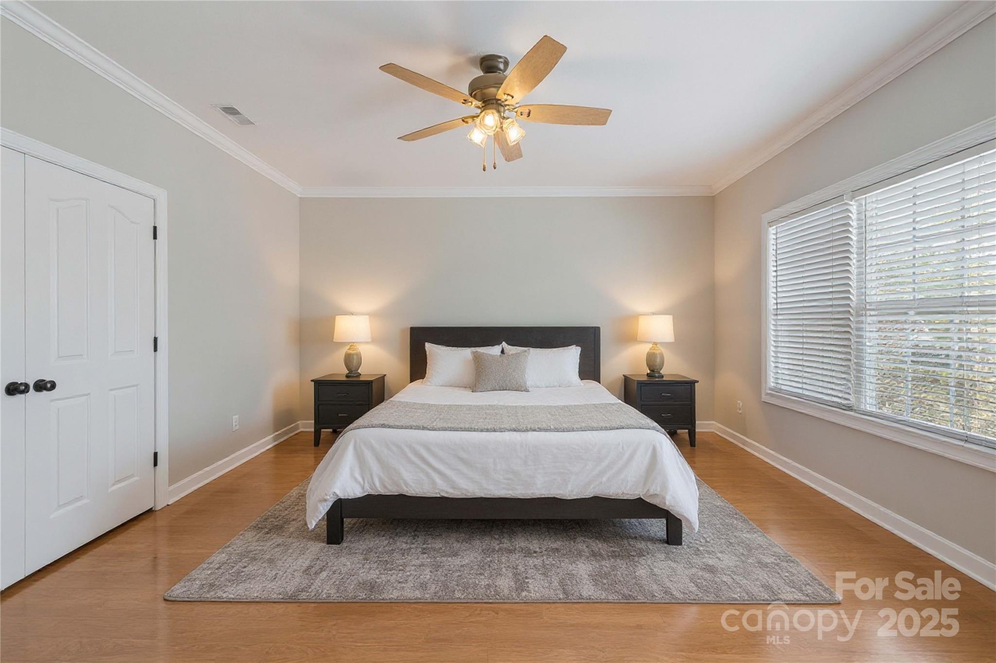 3214 Grandeur Road Charlotte, NC 28269 - Photo 8 of 18 a bedroom with a bed and window