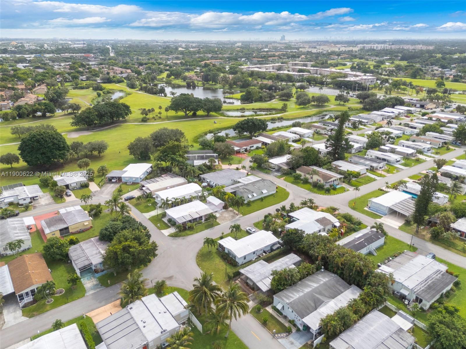8360 Southwest 21st Street Davie, FL 33324 - Photo 25 of 33 an aerial view of residential houses with outdoor space