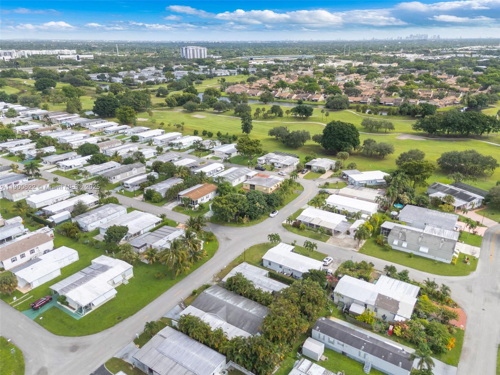 8360 Southwest 21st Street Davie, FL 33324 - Photo 27 of 33 an aerial view of residential houses with outdoor space and river
