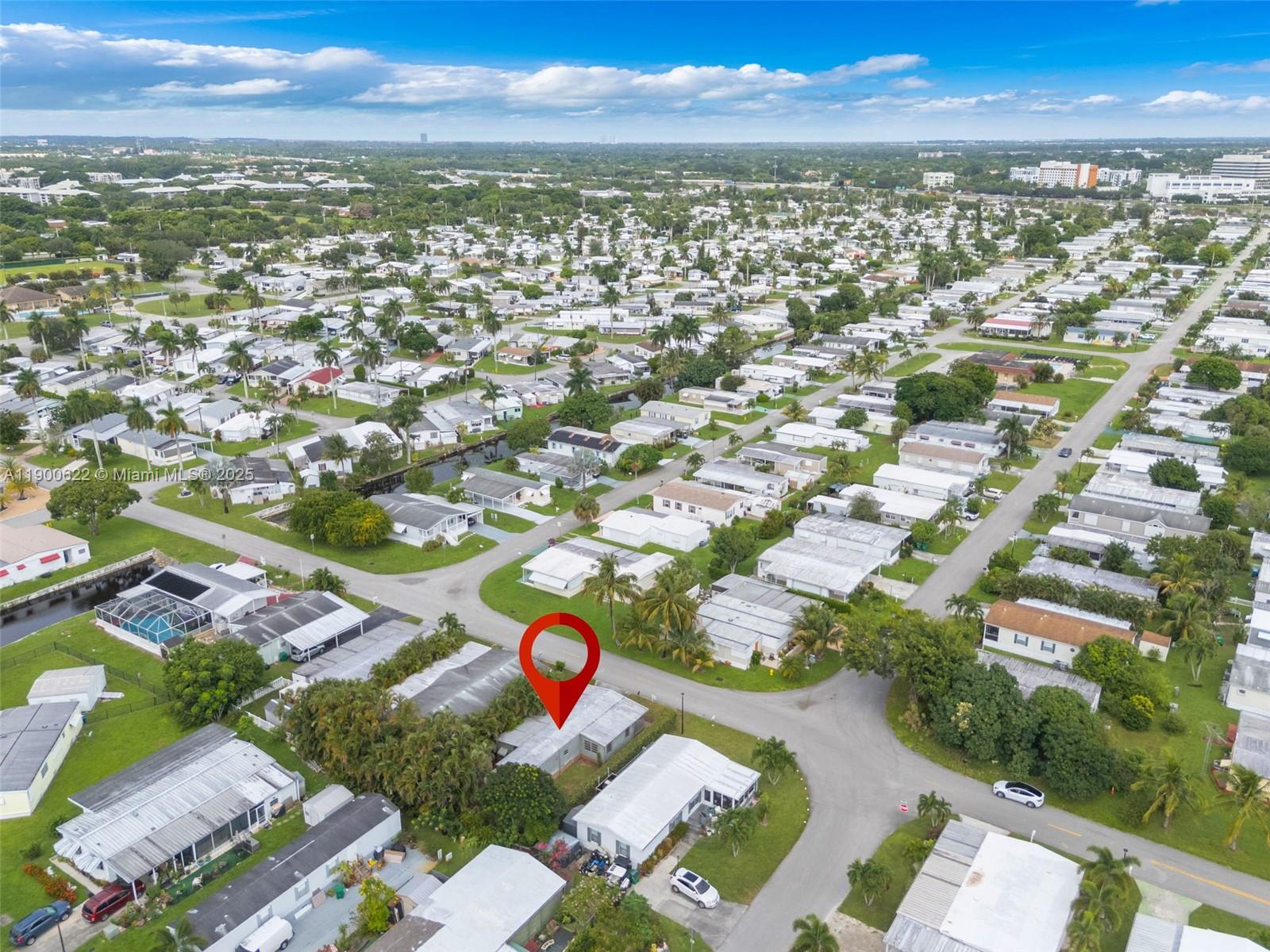 8360 Southwest 21st Street Davie, FL 33324 - Photo 28 of 33 an aerial view of city and lake