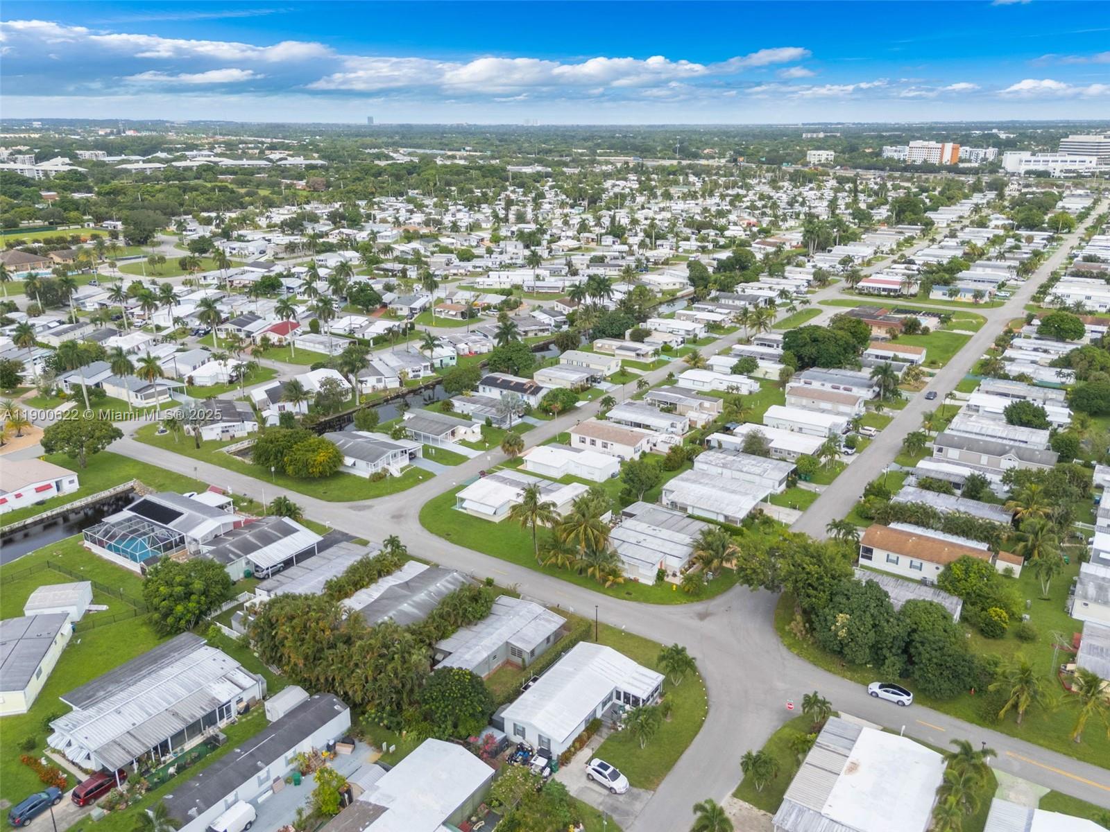 8360 Southwest 21st Street Davie, FL 33324 - Photo 29 of 33 an aerial view of residential houses with outdoor space
