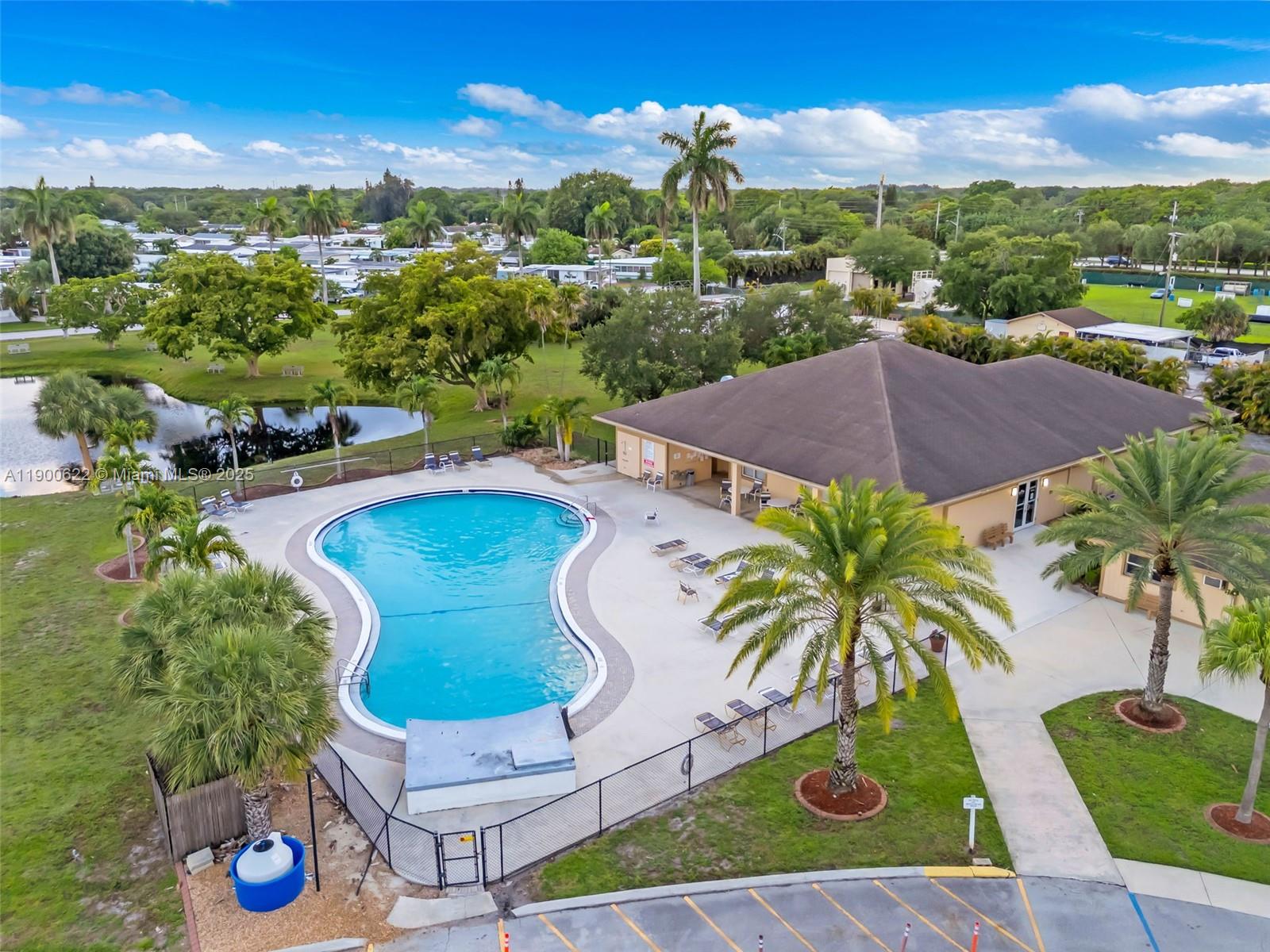 8360 Southwest 21st Street Davie, FL 33324 - Photo 32 of 33 an aerial view of a house with garden space and ocean view