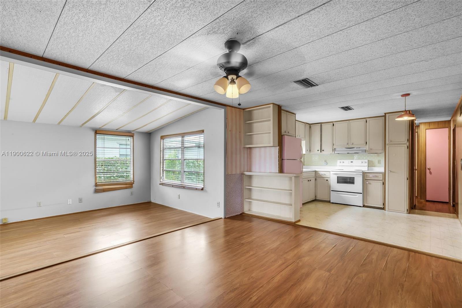 8360 Southwest 21st Street Davie, FL 33324 - Photo 7 of 33 a view of a kitchen with stove and cabinets